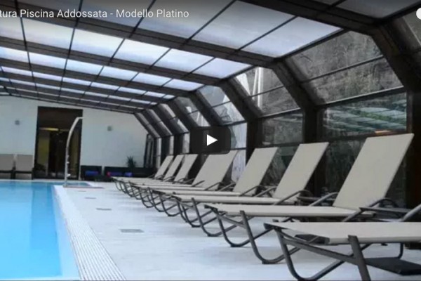 video copertura piscina addossata modello platino 600x400 1